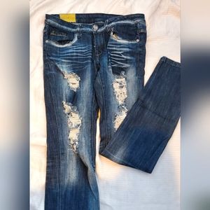 Distressed denim jeans